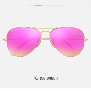 Pink reflective ray bans aviator sunglasses.
